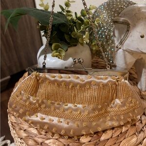 Elegant Gold Beaded Clutch